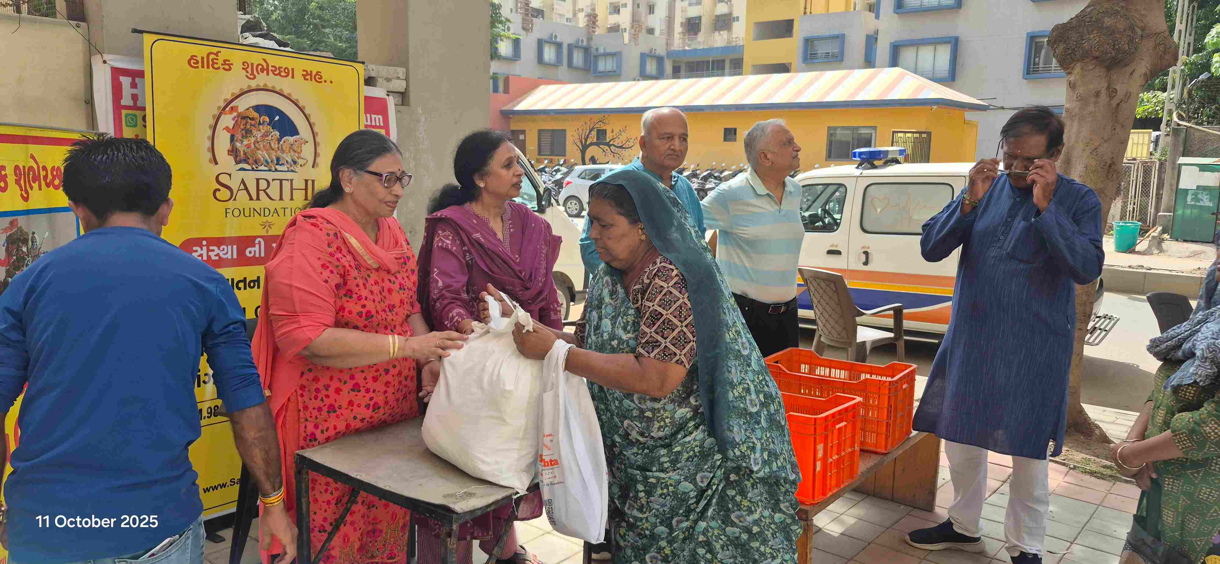 Community distribution of grocery kits to widows