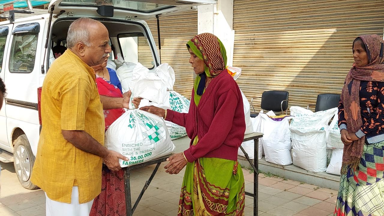 Mobile distribution of grocery supplies to widows
